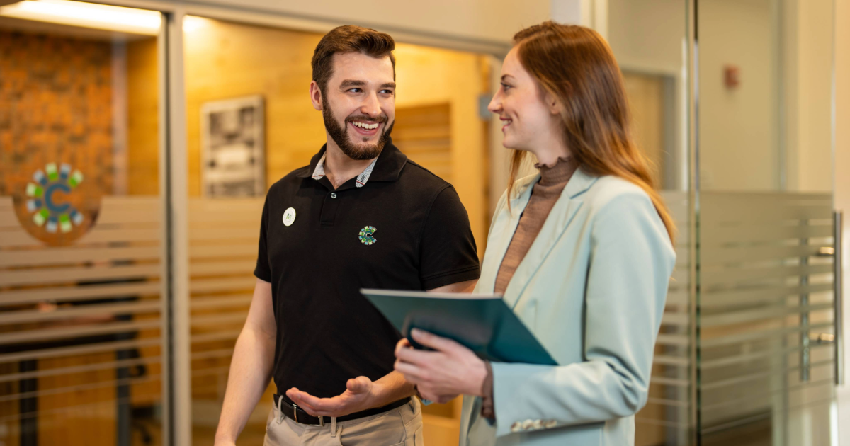 man and woman discussing financial planning